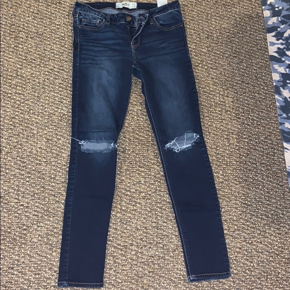 Ripped Hollister jeans.